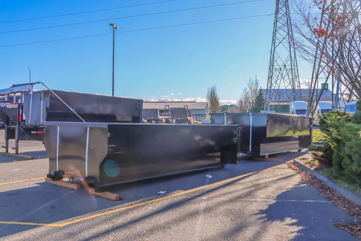 Roll-off dumpster ready for waste disposal at job site for Construction Dumpster Rental in Elsa